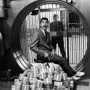 Ali-Sitting on $$
